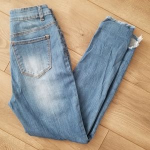 Fashion Nova high waisted distressed jeans